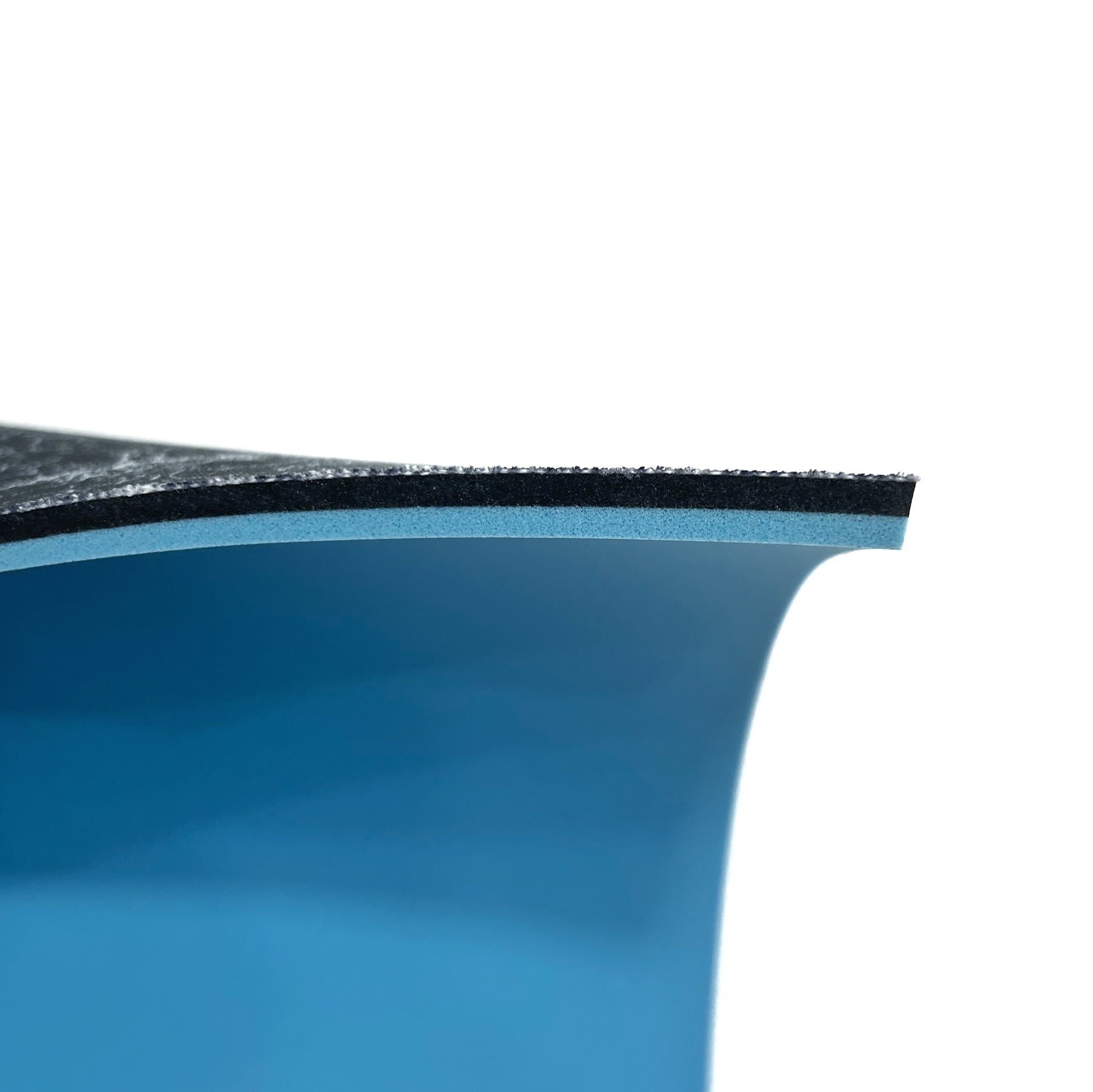 Side profile of our Comfy 1/4" (6 mm) insole. You can see the Silver Infused Footbed, the Black FoamFuzion midlayer, and the Blue BounceBlu Bottom layer.