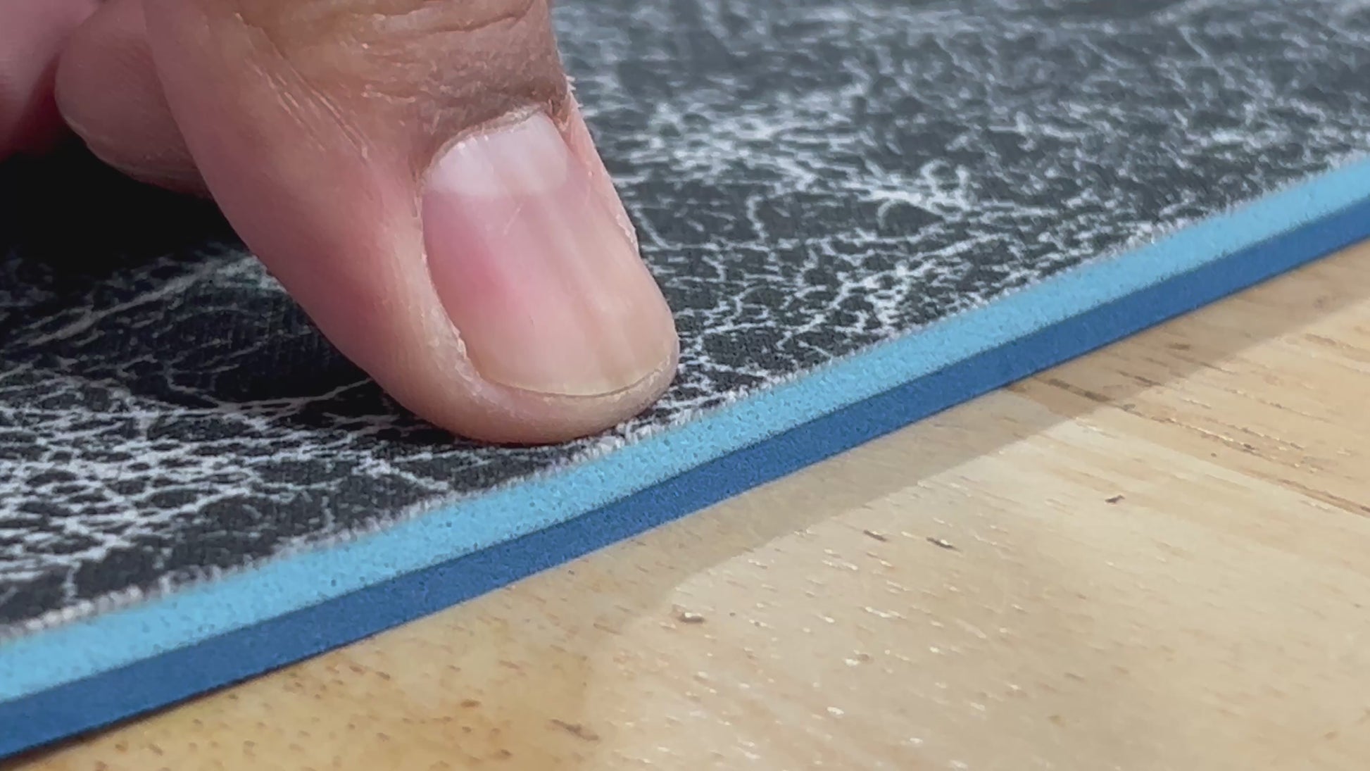 Close-up of textured edge of our 1/4" insole sheet which combines 2 different insole materials plus the Pure silver infused AG 2.0 topliner.
The composition is 1/8"  BounceBlu foam on top, then the 1/8" Plush EVA foam at the bottom.