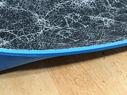 Close-up of textured edge of our 1/4" insole sheet which combines 2 different insole materials plus the Pure silver infused AG 2.0 topliner.

The composition is 1/8"  BounceBlu foam on top, then the 1/8" Plush EVA foam at the bottom.